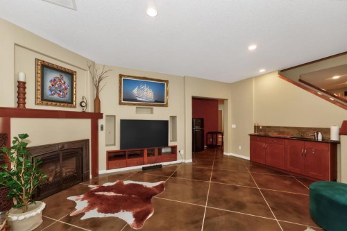 2735 Evercreek Bluffs Way Sw, Calgary, AB - Indoor With Fireplace