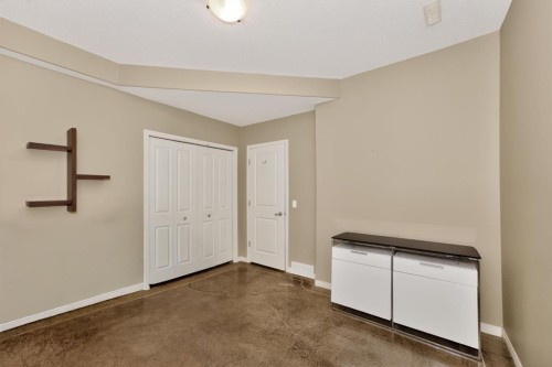 2735 Evercreek Bluffs Way Sw, Calgary, AB - Indoor Photo Showing Other Room