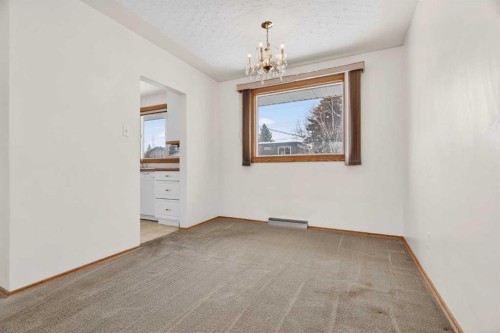 58 Westwood Drive Sw, Calgary, AB - Indoor Photo Showing Other Room