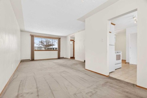 58 Westwood Drive Sw, Calgary, AB - Indoor Photo Showing Other Room