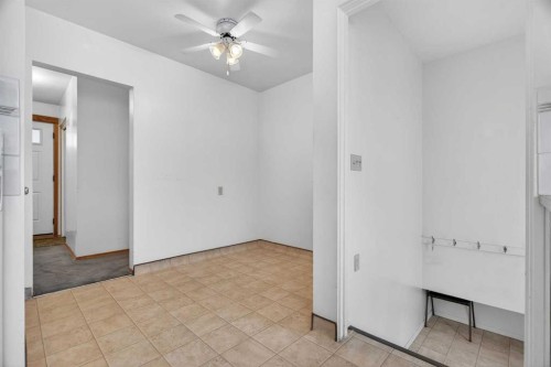 58 Westwood Drive Sw, Calgary, AB - Indoor Photo Showing Other Room