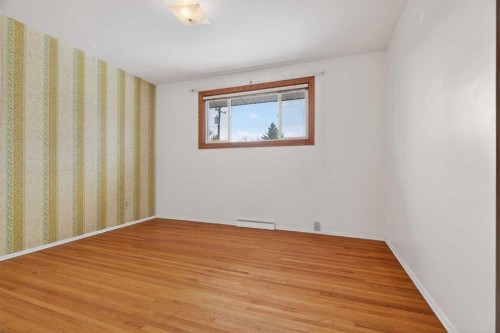 58 Westwood Drive Sw, Calgary, AB - Indoor Photo Showing Other Room