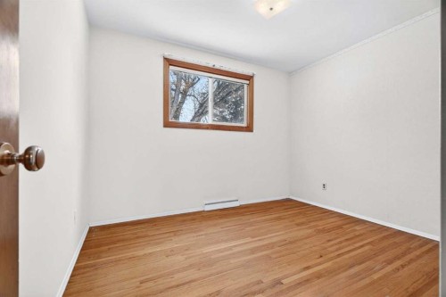 58 Westwood Drive Sw, Calgary, AB - Indoor Photo Showing Other Room