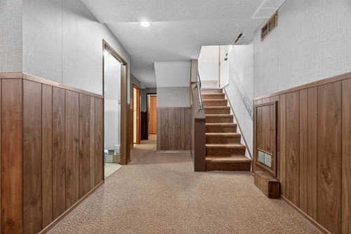 58 Westwood Drive Sw, Calgary, AB - Indoor Photo Showing Other Room