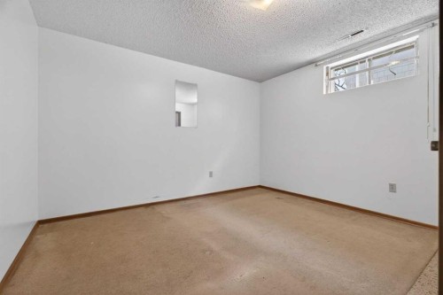 58 Westwood Drive Sw, Calgary, AB - Indoor Photo Showing Other Room