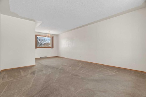58 Westwood Drive Sw, Calgary, AB - Indoor Photo Showing Other Room