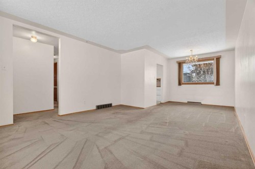 58 Westwood Drive Sw, Calgary, AB - Indoor Photo Showing Other Room