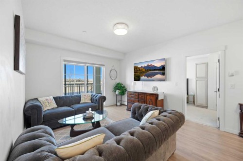 3108-99 Copperstone Park Se, Calgary, AB - Indoor Photo Showing Living Room