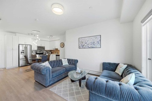 3108-99 Copperstone Park Se, Calgary, AB - Indoor Photo Showing Living Room