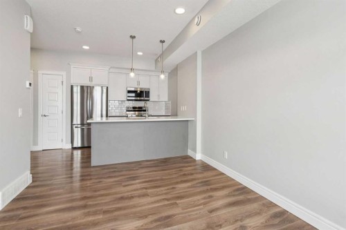 394 Seton Passage Se, Calgary, AB - Indoor Photo Showing Kitchen With Stainless Steel Kitchen With Upgraded Kitchen