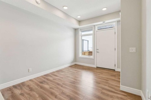 394 Seton Passage Se, Calgary, AB - Indoor Photo Showing Other Room
