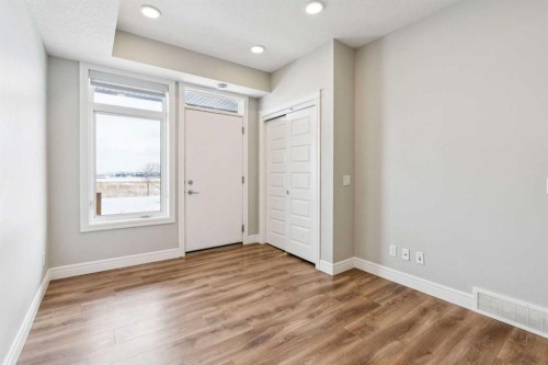 394 Seton Passage Se, Calgary, AB - Indoor Photo Showing Other Room