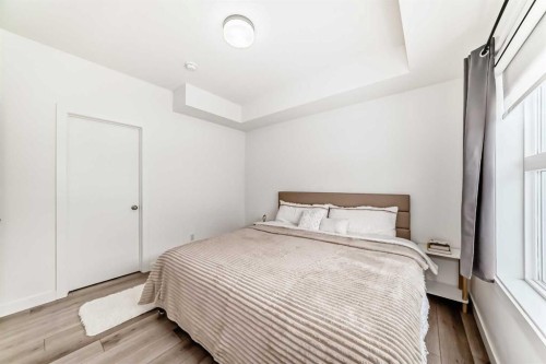 44 Spring Creek Common Sw, Calgary, AB - Indoor Photo Showing Bedroom