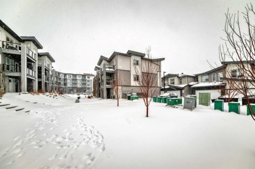 44 Spring Creek Common Sw, Calgary, AB - Outdoor With Facade