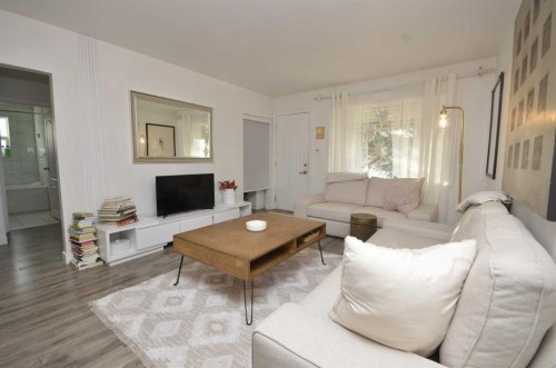 2412 35 Street Se, Calgary, AB - Indoor Photo Showing Living Room