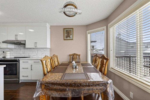 166 Evansmeade Circle North, Calgary, AB - Indoor Photo Showing Dining Room