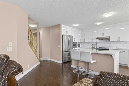 166 Evansmeade Circle North, Calgary, AB - Indoor Photo Showing Kitchen With Upgraded Kitchen