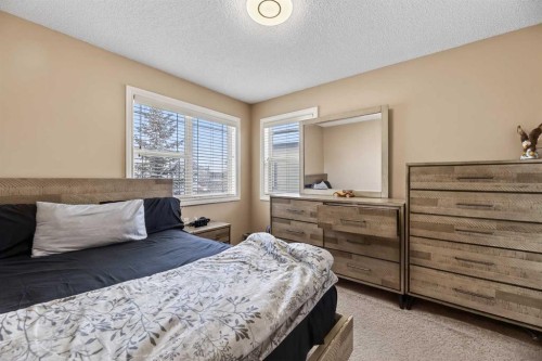 166 Evansmeade Circle North, Calgary, AB - Indoor Photo Showing Bedroom