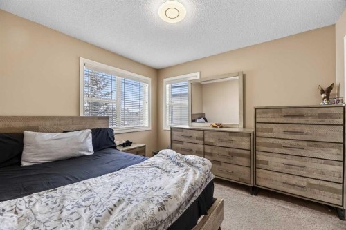 166 Evansmeade Circle North, Calgary, AB - Indoor Photo Showing Bedroom