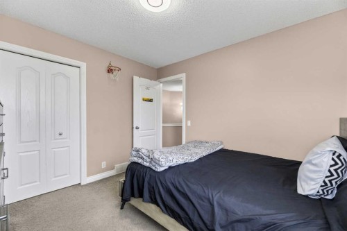 166 Evansmeade Circle North, Calgary, AB - Indoor Photo Showing Bedroom