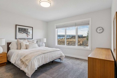 24 Willow Park Point, Cochrane, AB - Indoor Photo Showing Bedroom