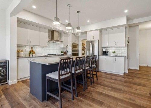 24 Willow Park Point, Cochrane, AB - Indoor Photo Showing Kitchen With Upgraded Kitchen