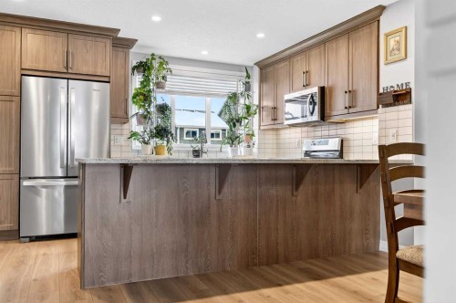 287 Masters Row Se, Calgary, AB - Indoor Photo Showing Kitchen With Upgraded Kitchen