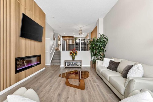 287 Masters Row Se, Calgary, AB - Indoor Photo Showing Living Room With Fireplace