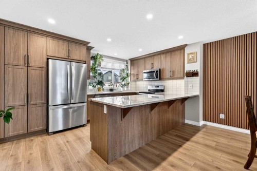 287 Masters Row Se, Calgary, AB - Indoor Photo Showing Kitchen With Upgraded Kitchen