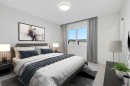 275 Waterford Heights, Chestermere, AB  - Indoor Photo Showing Bedroom 