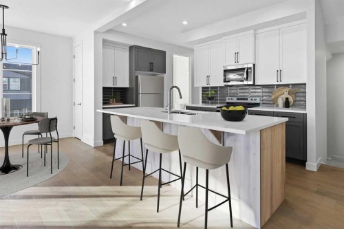 22 Waterford Link, Chestermere, AB - Indoor Photo Showing Kitchen With Upgraded Kitchen