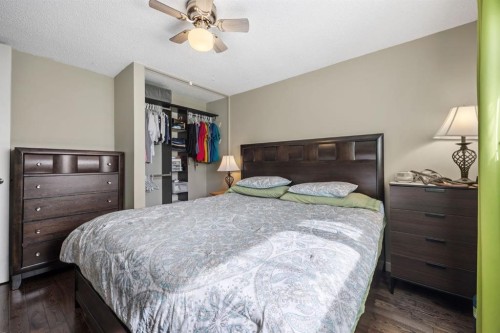 2302 Olympia Drive Se, Calgary, AB - Indoor Photo Showing Bedroom