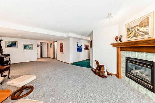 157 Hawkstone Manor Nw, Calgary, AB - Indoor With Fireplace