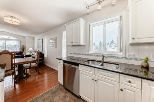 157 Hawkstone Manor Nw, Calgary, AB - Indoor Photo Showing Kitchen With Double Sink