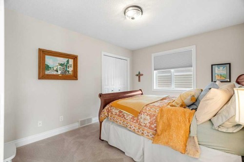 274 Somme Avenue Sw, Calgary, AB - Indoor Photo Showing Bedroom