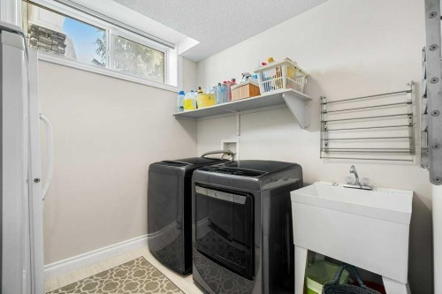 274 Somme Avenue Sw, Calgary, AB - Indoor Photo Showing Laundry Room