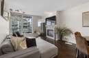1322-222 Riverfront Avenue Sw, Calgary, AB  - Indoor Photo Showing Living Room With Fireplace 