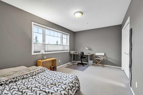 86 Evergreen Common Sw, Calgary, AB - Indoor Photo Showing Bedroom