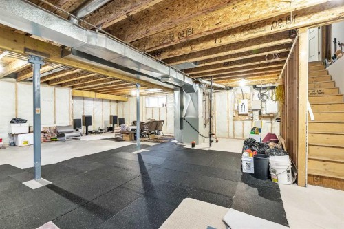 86 Evergreen Common Sw, Calgary, AB - Indoor Photo Showing Basement