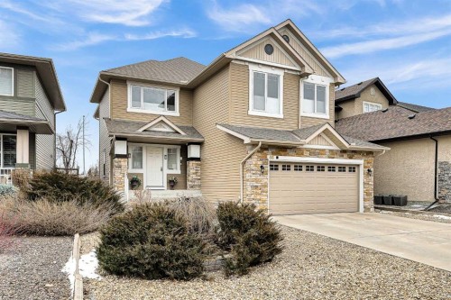 86 Evergreen Common Sw, Calgary, AB - Outdoor With Facade