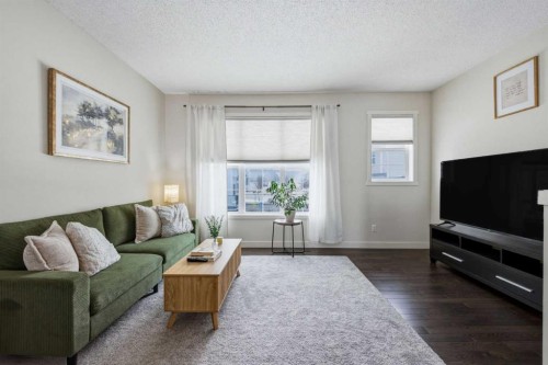 214 Nolanfield Villas Nw, Calgary, AB - Indoor Photo Showing Living Room