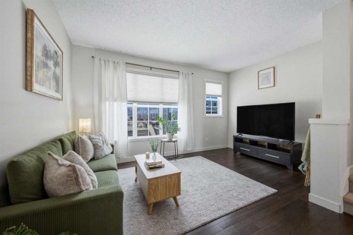 214 Nolanfield Villas Nw, Calgary, AB - Indoor Photo Showing Living Room