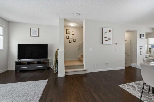 214 Nolanfield Villas Nw, Calgary, AB - Indoor Photo Showing Living Room