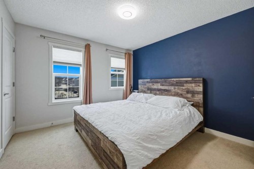 214 Nolanfield Villas Nw, Calgary, AB - Indoor Photo Showing Bedroom