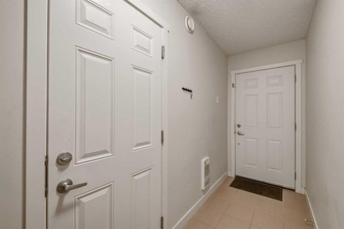 214 Nolanfield Villas Nw, Calgary, AB - Indoor Photo Showing Other Room