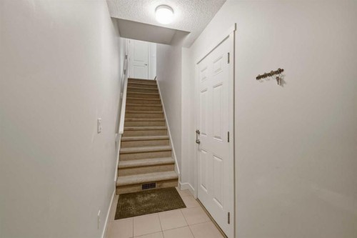214 Nolanfield Villas Nw, Calgary, AB - Indoor Photo Showing Other Room