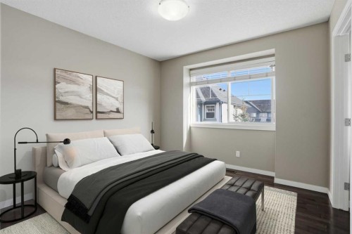 205 New Brighton Row Se, Calgary, AB - Indoor Photo Showing Bedroom