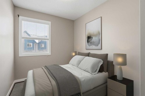 205 New Brighton Row Se, Calgary, AB - Indoor Photo Showing Bedroom