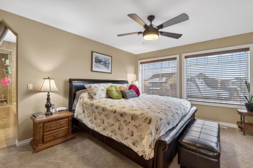 2 Ranchers Green, Okotoks, AB - Indoor Photo Showing Bedroom