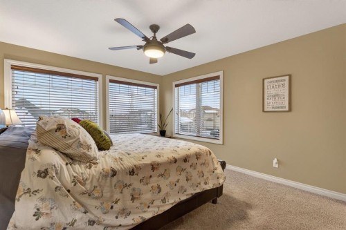 2 Ranchers Green, Okotoks, AB - Indoor Photo Showing Bedroom